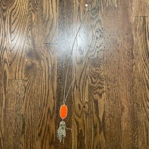 Orange Kendra Scott pendant necklace
